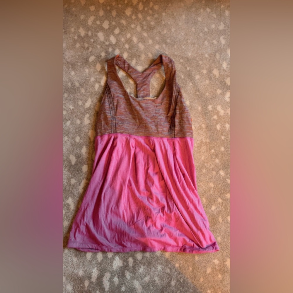 I’m selling a Lululemon tank-top! It’s a purple color and it has a built in bra!